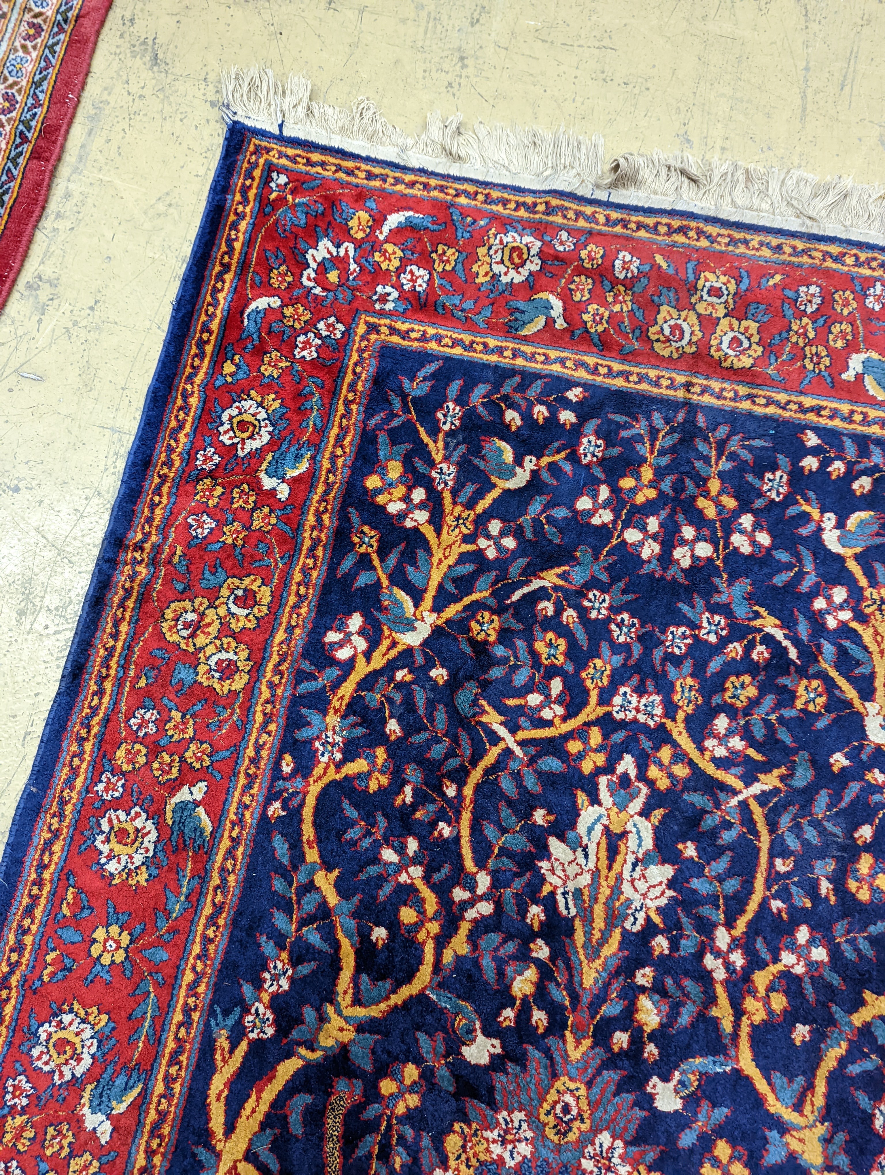 A Caucasian design ivory ground carpet, 260 x 158cm together with a smaller Tabriz style Tree of Life rug